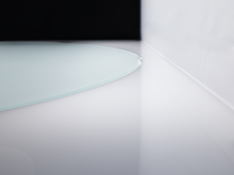 glass detail of the backlit turntable holding products until 200kg